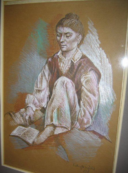 Seated female with book