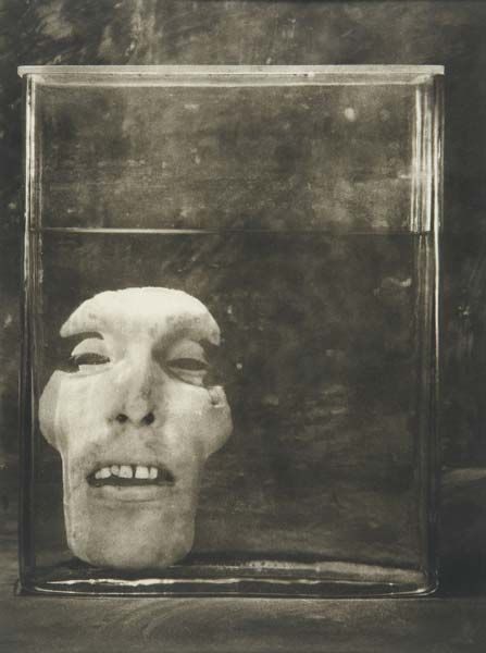 Two works of art: Sliced Face In Jar #1, 1985