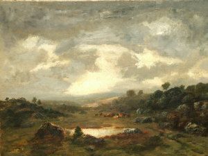 Cattle resting on a hillside beneath cloudy skies