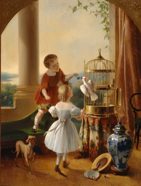 Playing children with bird