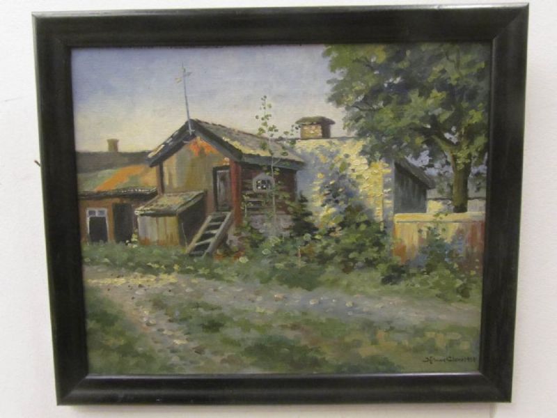 Landskap med hus