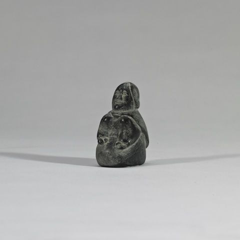 KNEELING WOMAN