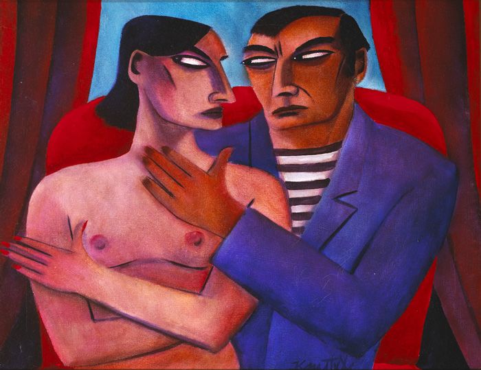 COUPLE IN A RED CHAIR