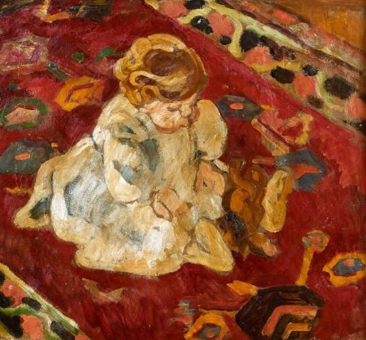 L'ENFANT AU TAPIS