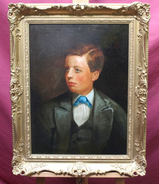 Portrait of a boy wearing a bow tie
